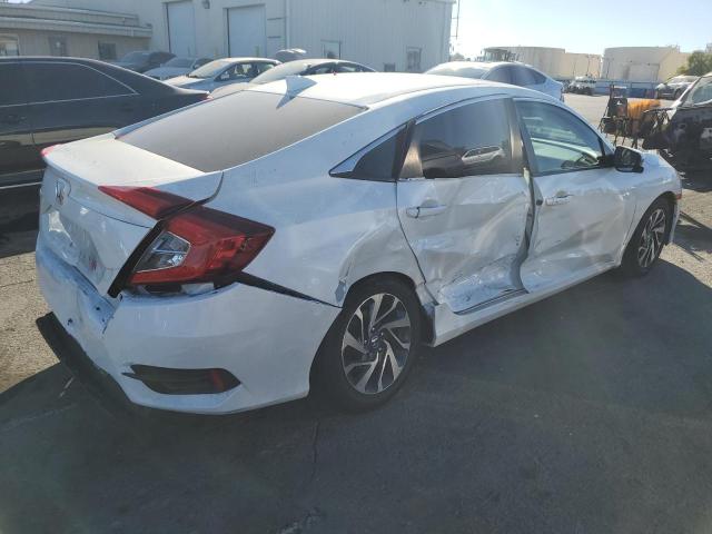 Photo 3 from auction – 2018 HONDA CIVIC EX with VIN 2HGFC2F79JH525915