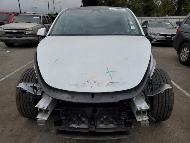 Photo 5 from auction – 2023 TESLA MODEL Y with VIN 7SAYGDEE8PA151450