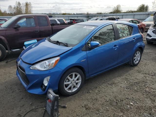 TOYOTA PRIUS C 2015 with VIN JTDKDTB34F1095848 - Photo from auction