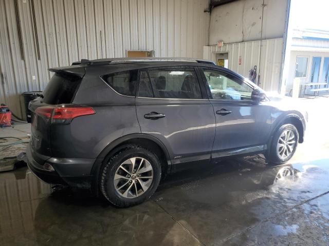 Photo 3 from auction – 2017 TOYOTA RAV4 HV LE with VIN JTMRJREV2HD089216