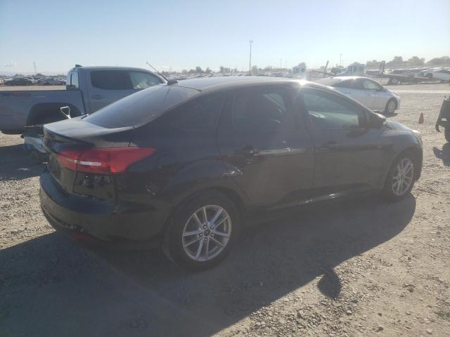 Photo 3 from auction – 2015 FORD FOCUS SE with VIN 1FADP3F29FL257033