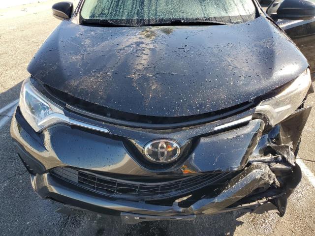 Photo 12 from auction – 2018 TOYOTA RAV4 LE with VIN 2T3ZFREVXJW469639
