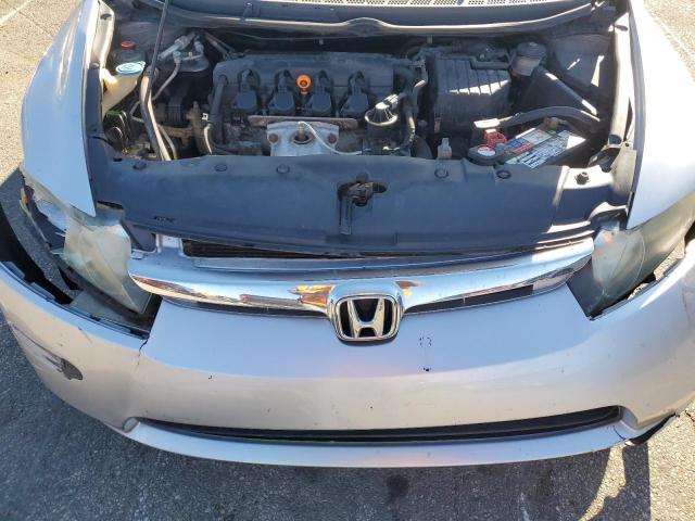 Photo 11 from auction – 2007 HONDA CIVIC LX with VIN 1HGFA16507L080202