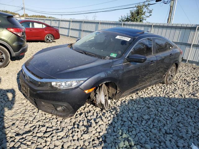 Photo 1 from auction – 2018 HONDA CIVIC EX with VIN JHMFC1F35JX032393