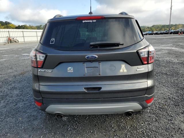 Photo 6 from auction – 2018 FORD ESCAPE SE with VIN 1FMCU0GD8JUD07349