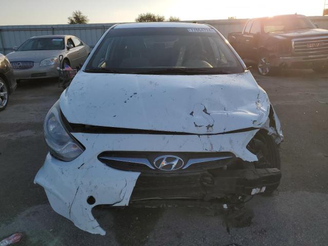Photo 5 from auction – 2014 HYUNDAI ACCENT GLS with VIN KMHCT5AE9EU141429