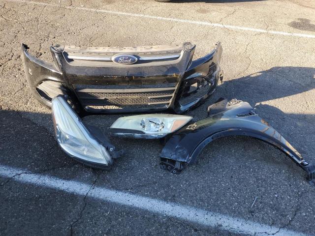 Photo 13 from auction – 2016 FORD ESCAPE SE with VIN 1FMCU0G96GUB60260