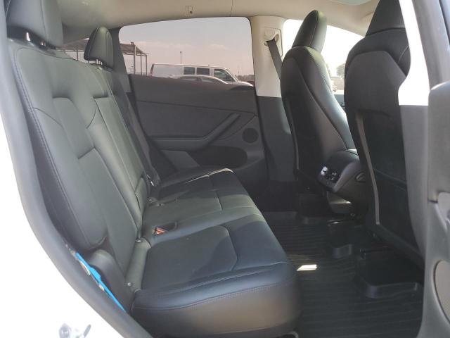 Photo 10 from auction – 2023 TESLA MODEL Y with VIN 7SAYGDEE0PA112111
