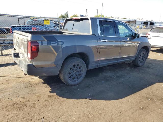Photo 3 from auction – 2022 HONDA RIDGELINE with VIN 5FPYK3F79NB038099