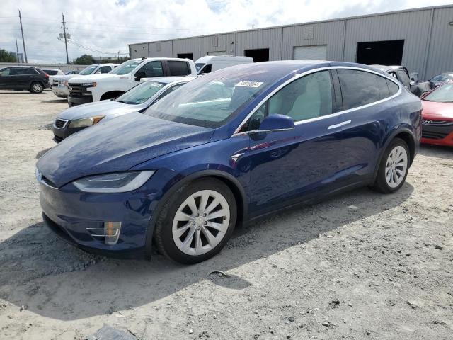 TESLA MODEL X 2020 with VIN 5YJXCDE27LF232897 - Photo from auction