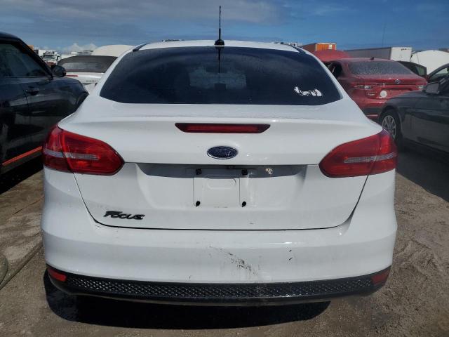 Photo 6 from auction – 2018 FORD FOCUS S with VIN 1FADP3E23JL300047