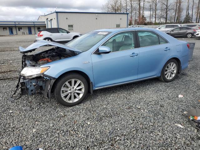 TOYOTA CAMRY HYBR 2012 with VIN 4T1BD1FK5CU035217 - Photo from auction