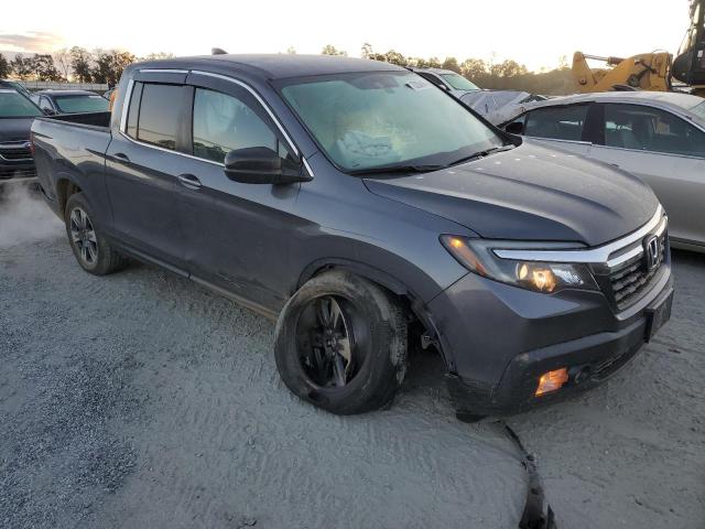 Photo 4 from auction – 2017 HONDA RIDGELINE with VIN 5FPYK3F51HB006721