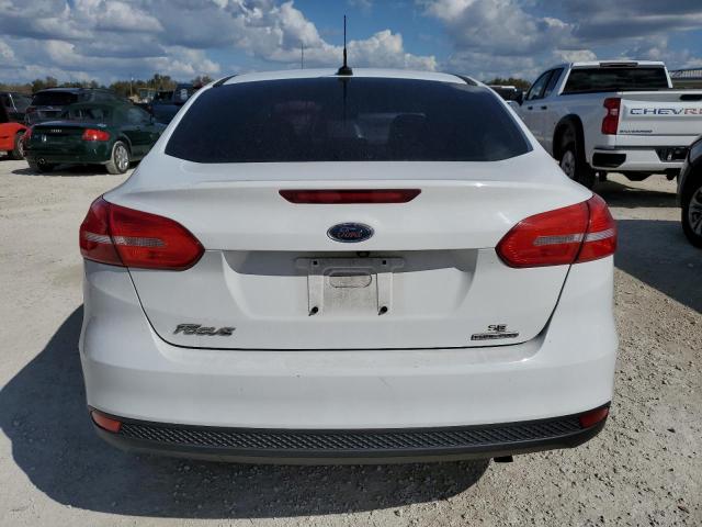 Photo 6 from auction – 2015 FORD FOCUS SE with VIN 1FADP3F25FL250578