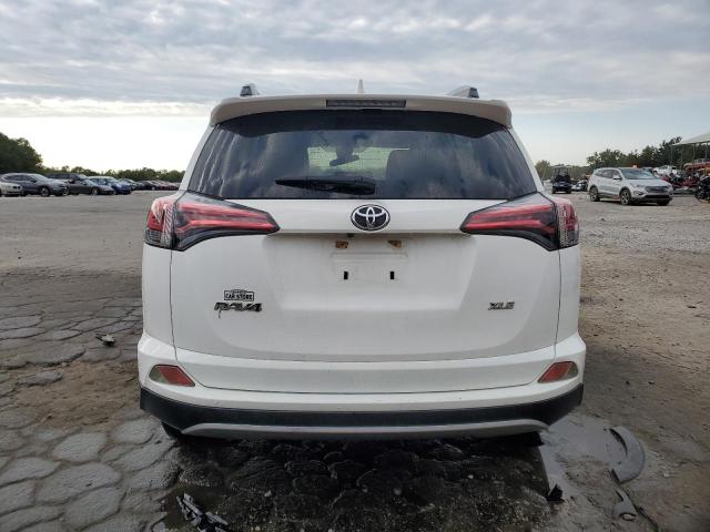 Photo 6 from auction – 2017 TOYOTA RAV4 XLE with VIN JTMWFREV5HJ115443