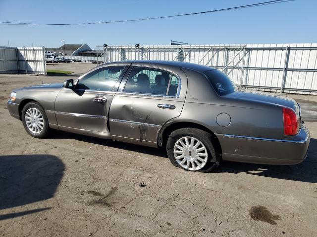 Photo 2 from auction – 2004 LINCOLN TOWN CAR E with VIN 1LNHM81W14Y614647