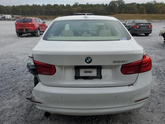 Photo 6 from auction – 2016 BMW 320 I with VIN WBA8E1G58GNU12141