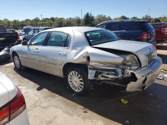 Photo 2 from auction – 2004 LINCOLN TOWN CAR E with VIN 1LNHM81W64Y668932