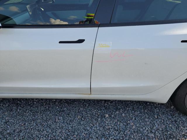 Photo 12 from auction – 2021 TESLA MODEL 3 with VIN 5YJ3E1EA4MF853756
