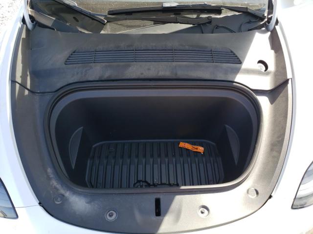Photo 11 from auction – 2023 TESLA MODEL Y with VIN 7SAYGAEE9PF626301