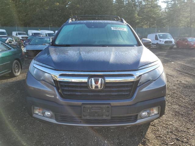 Photo 5 from auction – 2017 HONDA RIDGELINE with VIN 5FPYK3F79HB039760