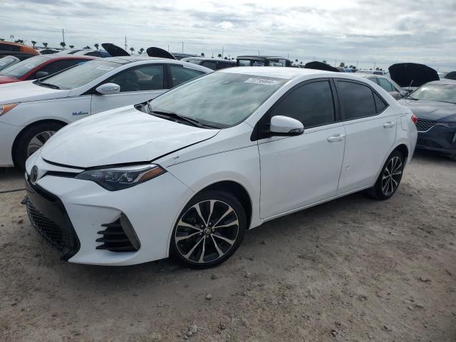 TOYOTA COROLLA L 2019 with VIN 5YFBURHE1KP901033 - Photo from auction