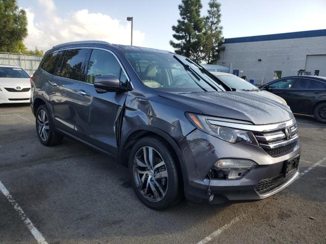 Photo 4 from auction – 2016 HONDA PILOT TOUR with VIN 5FNYF6H93GB009682