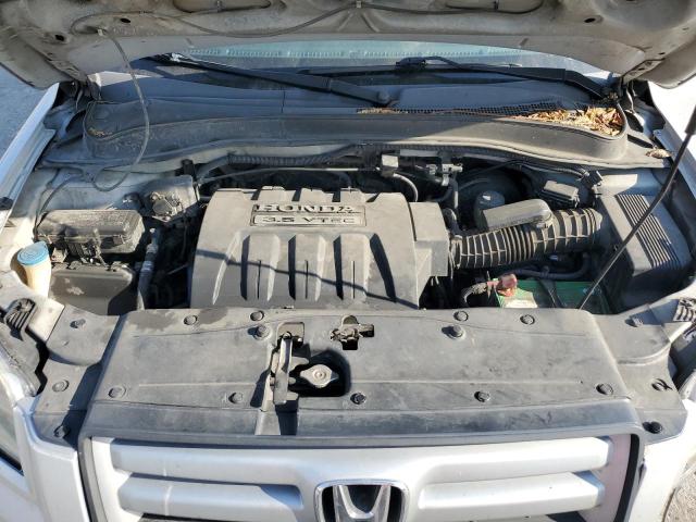Photo 12 from auction – 2006 HONDA PILOT EX with VIN 2HKYF18746H535661