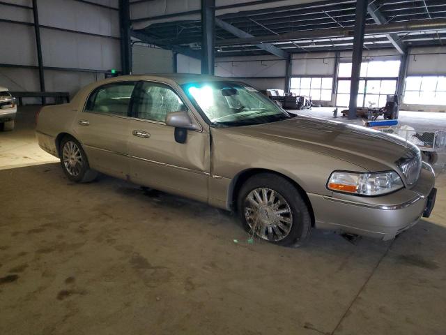 Photo 4 from auction – 2004 LINCOLN TOWN CAR E with VIN 1LNHM81W54Y677122