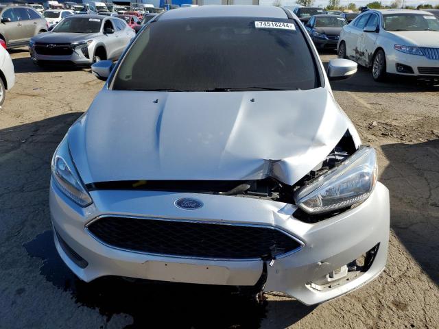 Photo 5 from auction – 2017 FORD FOCUS SE with VIN 1FADP3F20HL323522