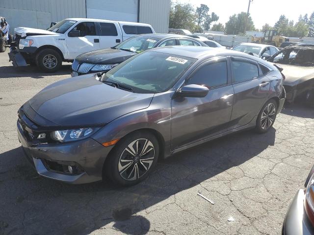 HONDA CIVIC EXL 2017 with VIN 2HGFC1F71HH658799 - Photo from auction