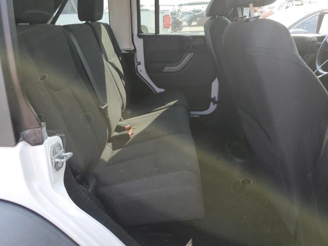 Photo 10 from auction – 2015 JEEP WRANGLER U with VIN 1C4BJWDG2FL759062