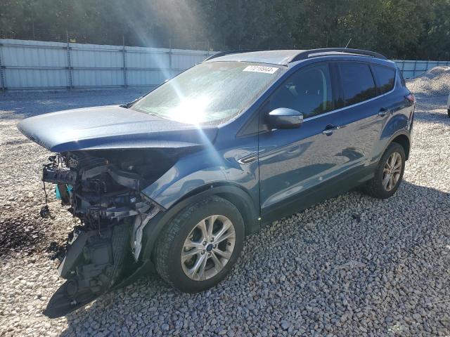 FORD ESCAPE SE 2018 with VIN 1FMCU9GD4JUB19870 - Photo from auction