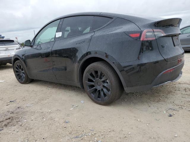 Photo 2 from auction – 2023 TESLA MODEL Y with VIN 7SAYGDEE8PA086812