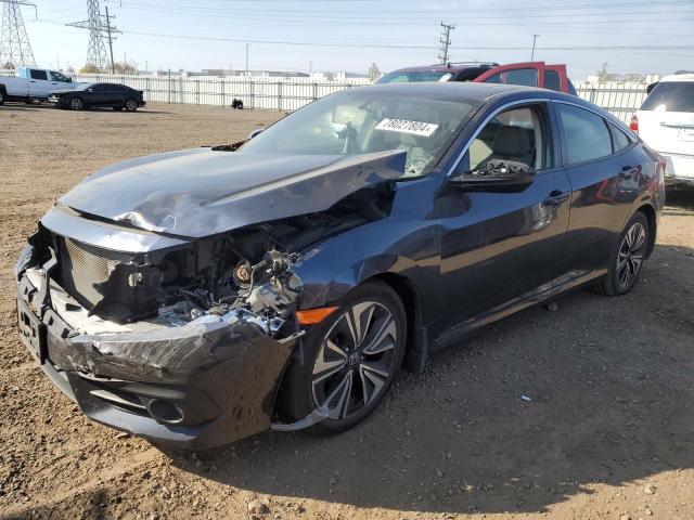 HONDA CIVIC EX 2017 with VIN 19XFC1F39HE031274 - Photo from auction
