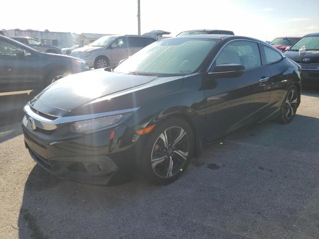 HONDA CIVIC TOUR 2016 with VIN 2HGFC3B90GH358561 - Photo from auction