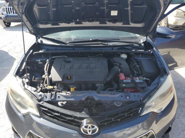 Photo 11 from auction – 2014 TOYOTA COROLLA L with VIN 5YFBURHE0EP014656