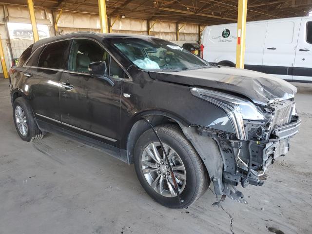 Photo 4 from auction – 2022 CADILLAC XT5 PREMIU with VIN 1GYKNCRS9NZ106945