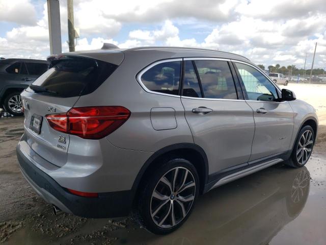 Photo 3 from auction – 2017 BMW X1 XDRIVE2 with VIN WBXHT3C3XH5F70805