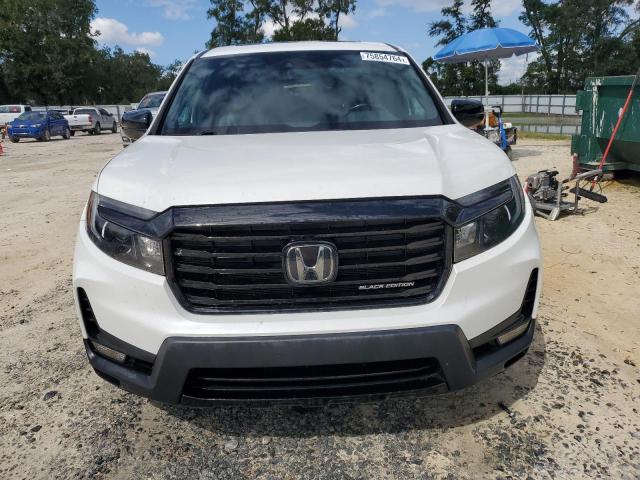 Photo 5 from auction – 2022 HONDA RIDGELINE with VIN 5FPYK3F87NB006017