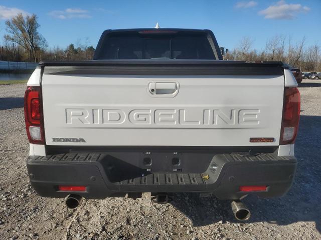Photo 6 from auction – 2024 HONDA RIDGELINE with VIN 5FPYK3F63RB008948