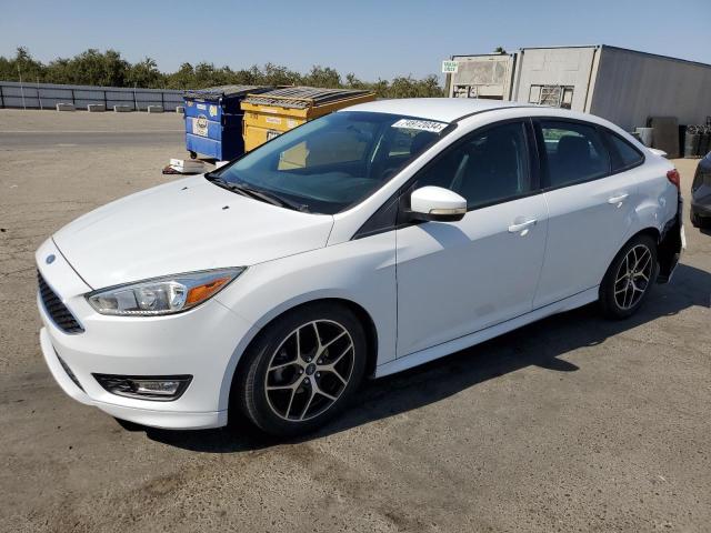 FORD FOCUS SE 2015 with VIN 1FADP3F22FL375621 - Photo from auction