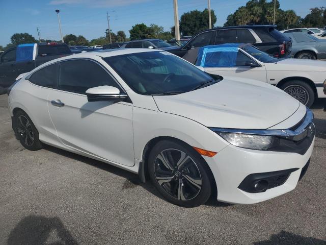 Photo 4 from auction – 2016 HONDA CIVIC TOUR with VIN 2HGFC3B98GH351454
