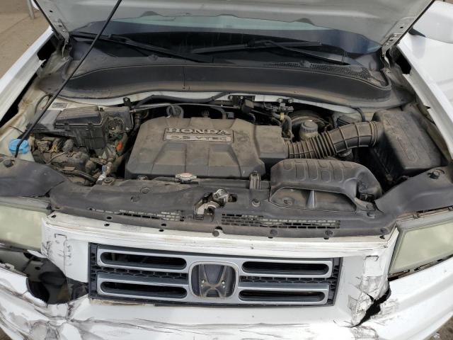 Photo 11 from auction – 2006 HONDA RIDGELINE with VIN 2HJYK16506H570523