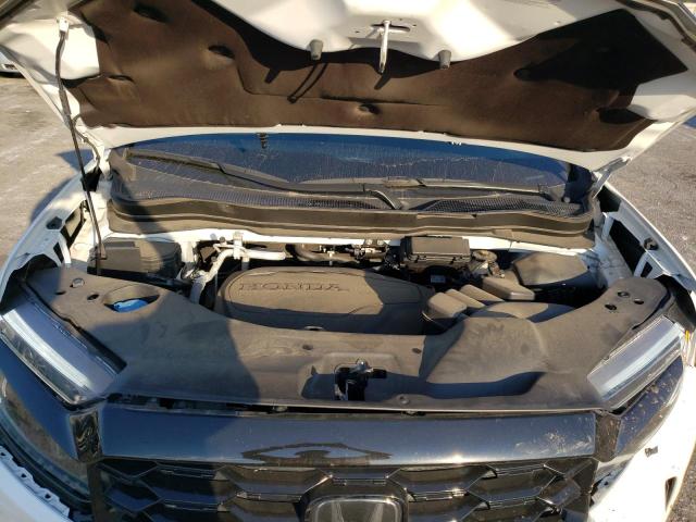 Photo 12 from auction – 2023 HONDA PASSPORT E with VIN 5FNYF8H04PB006352