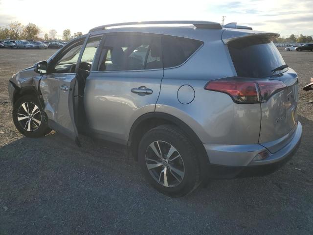 Photo 2 from auction – 2018 TOYOTA RAV4 LE with VIN 2T3ZFREV0JW486448