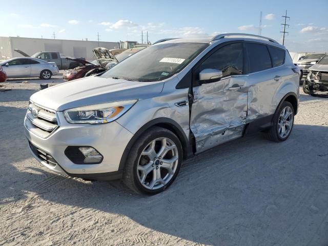 FORD ESCAPE TIT 2017 with VIN 1FMCU0J96HUF01568 - Photo from auction