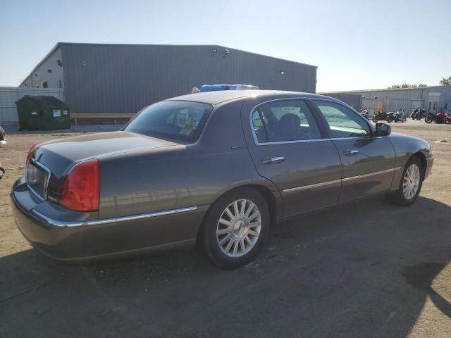 Photo 3 from auction – 2004 LINCOLN TOWN CAR E with VIN 1LNHM81W14Y614647