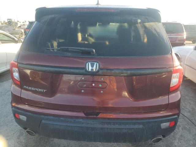 Photo 6 from auction – 2021 HONDA PASSPORT E with VIN 5FNYF7H56MB001445