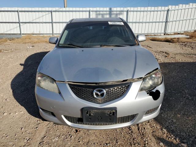 Photo 5 from auction – 2004 MAZDA MAZDA3 with VIN JM1BK12F461469685